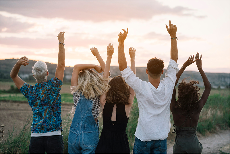 cheerful friends dancing and jumping in nature 2025 04 04 11 19 26 utc 1